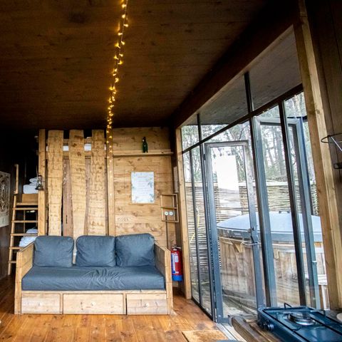 HÉBERGEMENT INSOLITE 5 personnes - Petite maison Cabine d'eau avec bain à remous