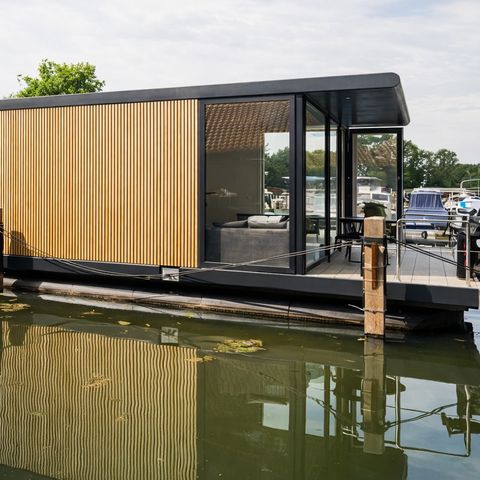 HÉBERGEMENT INSOLITE 4 personnes - Hébergement de luxe sur l'eau en Frise (41)