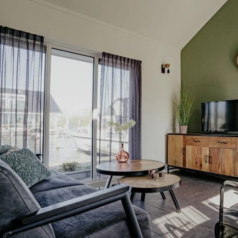 Maison 6 personnes - Maison au bord de l'eau adaptée aux personnes en fauteuil roulant à Uitgeest