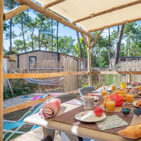 BUNGALOW 4 personnes - Garden 2ch-CLIM-baignoire-TV-LV-plancha-terrasse couverte-31m² | PREMIUM
