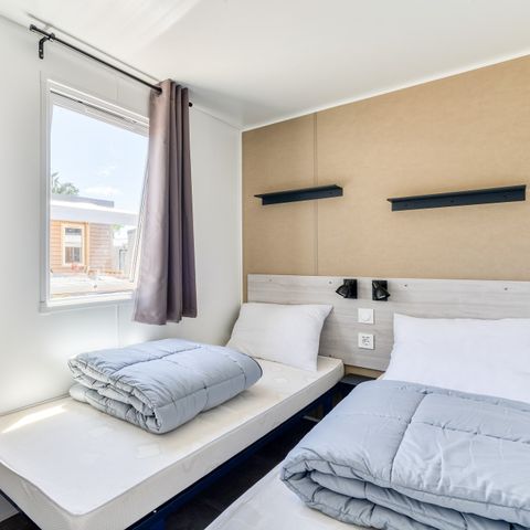 BUNGALOW 4 personnes - Mobil-home | Comfort XL | 2 Ch. | 4 Pers. | Terrasse surélevée | Clim. | TV