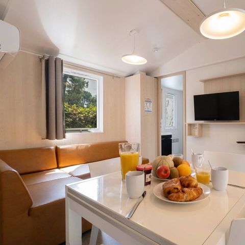 BUNGALOW 4 personnes - Mobil-home | Ultimate | 2 Ch. | 4 Pers. | Terrasse couverte | 1 SDB | Clim. | TV
