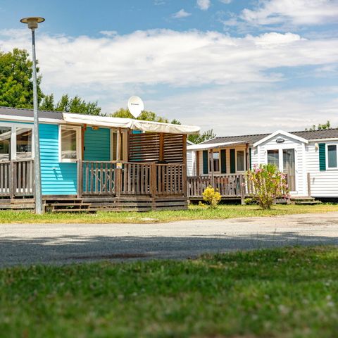 BUNGALOW 6 personnes - Mobil-home | Comfort | 3 Ch. | 6 Pers. | Terrasse couverte | 1 SDB | Clim. | TV