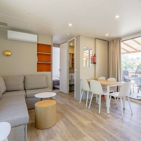 BUNGALOW 4 personnes - Mobil-home | Ultimate | 2 Ch. | 4 Pers. | Terrasse Lounge | 2 SDB | Clim. | TV