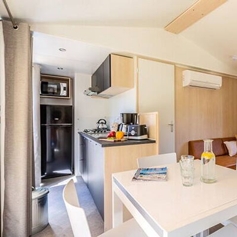 BUNGALOW 6 personnes - Mobil-home | Premium Exclusive | 3 Ch. | 6 Pers. | Terrasse surélevée | Jacuzzi | Douche extérieure | 1 SDB | Clim. | TV