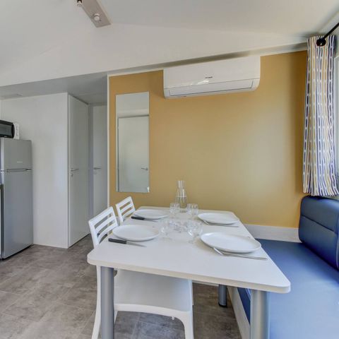 BUNGALOW 4 personnes - Mobil-home | Comfort | 2 Ch. | 4 Pers. | Terrasse surélevée | 1 SDB | Clim.