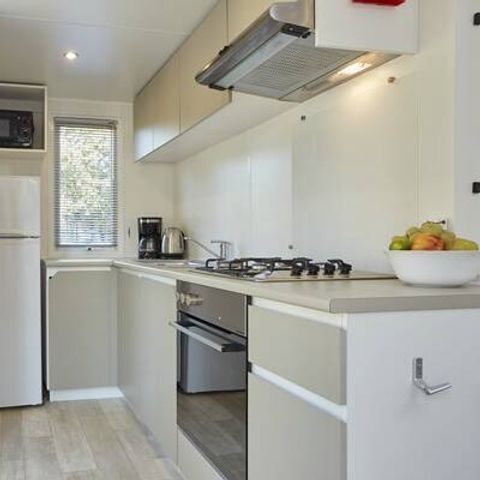 BUNGALOW 6 personnes - Comfort | 2 Ch. | 4/6 Pers. | Terrasse surélevée | 1 SDB | Clim.
