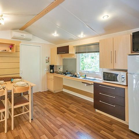 BUNGALOW 4 personnes - Mobil-home PMR | Comfort XL | 2 Ch. | 4/6 Pers. | Terrasse surélevée | Clim. | TV