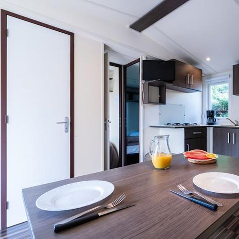 Mobilhome 2 personnes - Mobil-home Plage 18.6m² (+ de 10 ans) (1 chambre) + Terrasse bois semi-couverte + TV 2 pers