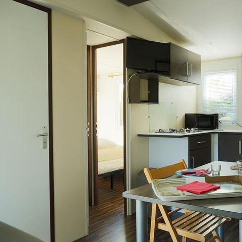 BUNGALOW 2 personnes - Mobil-home Plage 18.6m² (+ de 10 ans) (1 chambre) + Terrasse bois semi-couverte + TV 2 pers