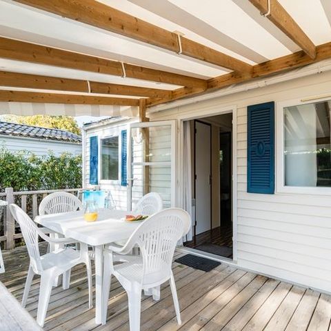 Mobilhome 2 personnes - Mobil-home Plage 18.6m² (+ de 10 ans) (1 chambre) + Terrasse bois semi-couverte + TV 2 pers
