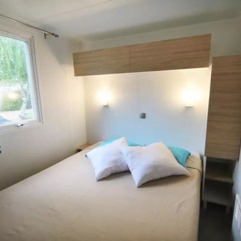 Mobilhome 4 personnes - Confort 2 chambres Loggia - Terrasse semi couverte