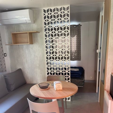 Mobilhome 2 personnes - Mobil home Premium 21m² 1 chambre + terrasse 12m² semi-couverte (9m²) - TV + Climatisation 2 pers