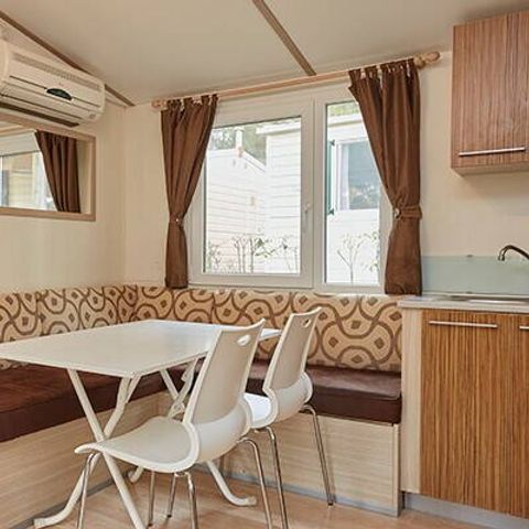 BUNGALOW 4 personnes - Comfort | 2 Ch. | 4 Pers. | Terrasse surélevée | Clim. | TV