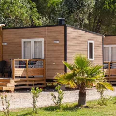 BUNGALOW 6 personnes - Mobil-home | Premium | 3 Ch. | 6 Pers. | Terrasse Lounge | 1 SDB | Clim.