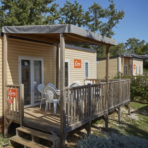 BUNGALOW 6 personnes - Comfort XL | 2 Ch. | 4/6 Pers. | Terrasse surélevée | 2 SDB | Clim. | TV