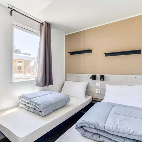 BUNGALOW 4 personnes - Mobil-home | Premium | 2 Ch. | 4 Pers. | Terrasse Lounge | 1 SDB | Clim.
