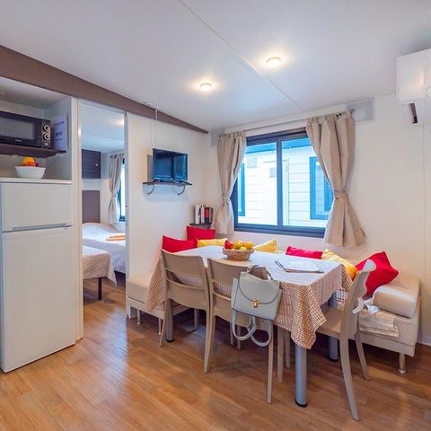BUNGALOW 6 personnes - Premium | 3 Ch. | 6 Pers. | Terrasse surélevée | Clim. | TV