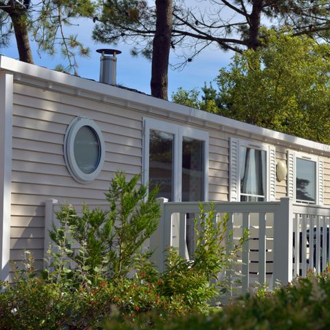 Mobilhome 4 personnes - Cottage Confort 2ch. 4pers. -30m2 - Terrasse parasol - SAM