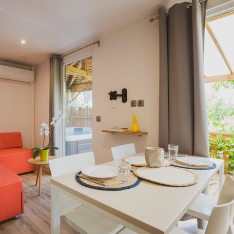 Mobilhome 4 personnes - Moorea 52 m² - 3 pièces - 2 chambres - Jacuzzi privatif - Climatisation
