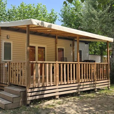 Mobilhome 8 personnes - Comfort | 4 Ch. | 8 Pers. | Terrasse surélevée | Cuisine extérieure | 2 SDB | Clim.