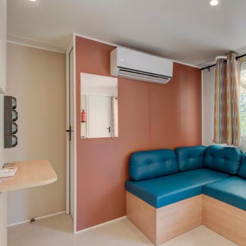 Mobilhome 8 personnes - Comfort | 4 Ch. | 8 Pers. | Terrasse surélevée | Cuisine extérieure | 2 SDB | Clim.