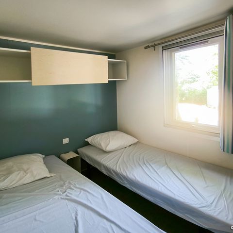 BUNGALOW 4 personnes - Standard 32m² - 2 chambres + terrasse couverte 12m²