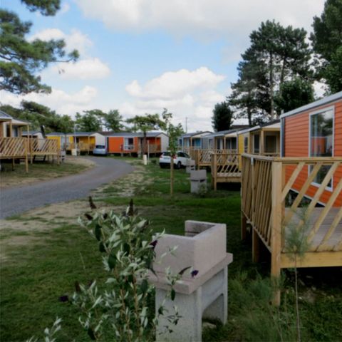 BUNGALOW 4 personnes - MOBIL HOME CONFORT DIM  plaque gaz refrigérateur  vaisselle télévision