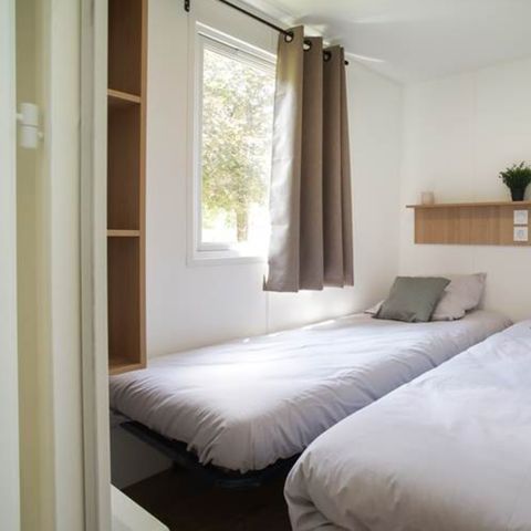 BUNGALOW 4 personnes - Nest29  30,8 m²- 2 chambres + Terrasse couverte + TV