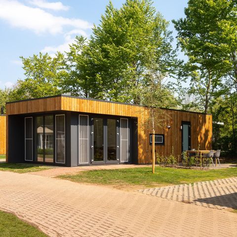 Hébergement pour groupe 28 personnes - 7x Happy Oak Lodge (avec jacuzzi)