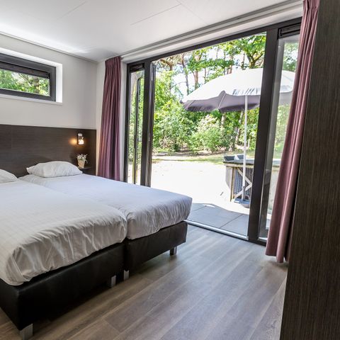 BUNGALOW 6 personnes - Forest Lodge 75 avec bain à remous et sauna