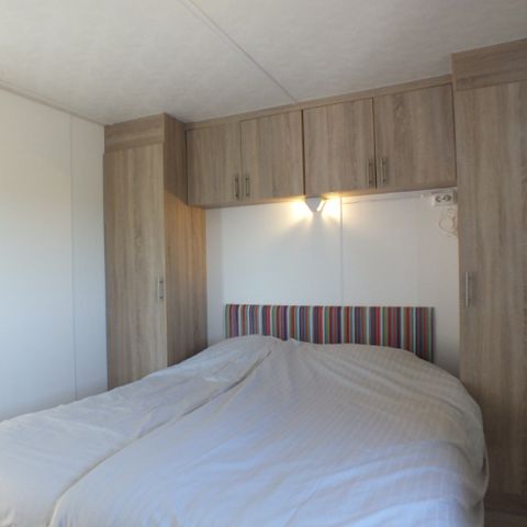 Mobilhome 4 personnes - avec terrasse au bord de l'eau