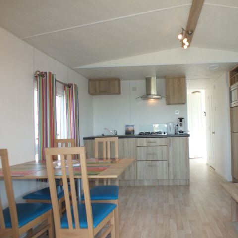Mobilhome 4 personnes - avec terrasse au bord de l'eau