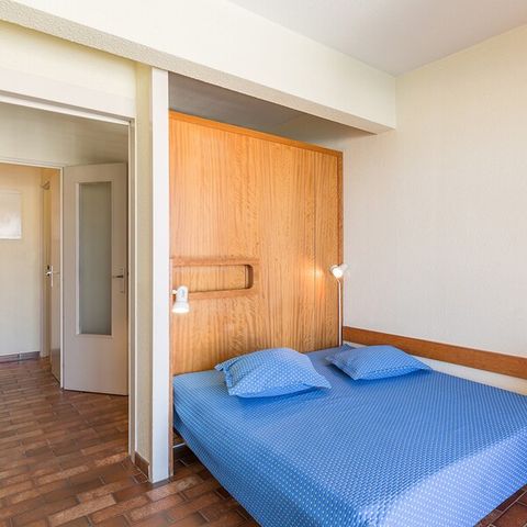 Appartement 6 personnes - 1 chambre - 1 coin - Nuit - Vue port