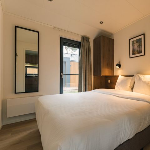 Lodge 4 personnes - Pavillon forestier avec bain à remous et sauna