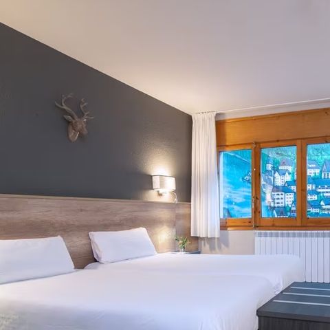 Chambre 3 personnes - Chambre d'hôtel Mountainview