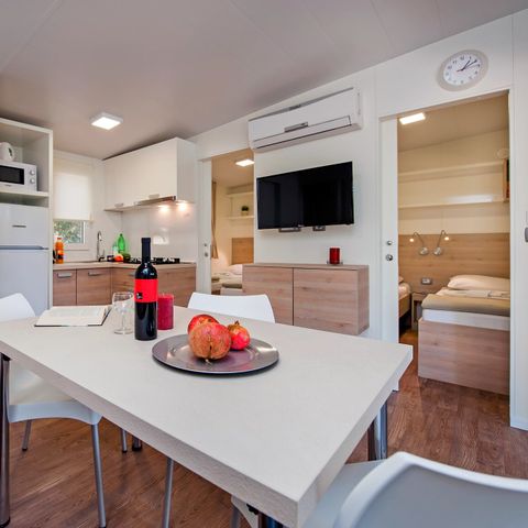 Mobilhome 6 personnes - Comfort XL | 3 Ch. | 6 Pers. | Terrasse surélevée | 2 SDB | Clim. | TV